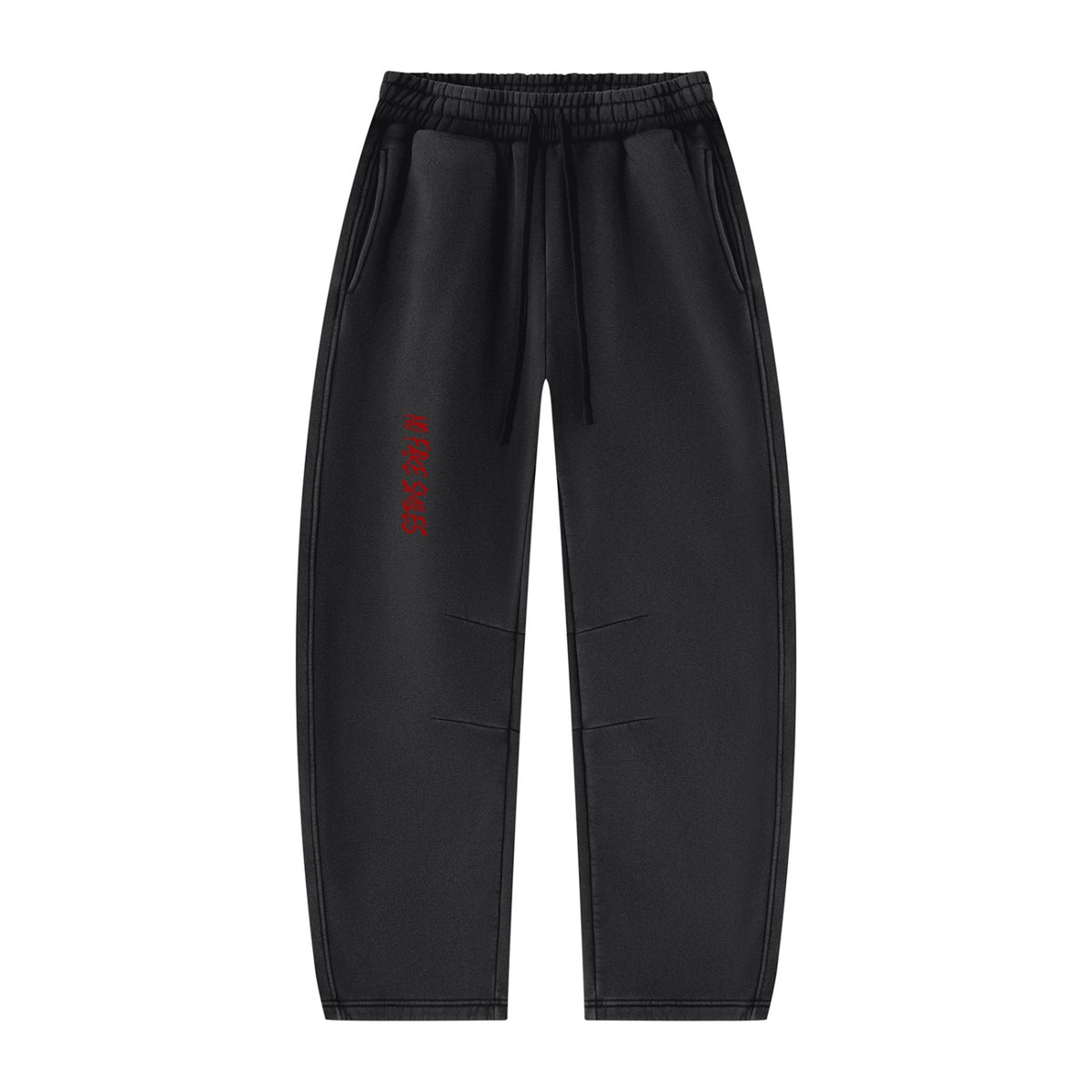 No Fake Smiles black vintage-wash fleece sweatpants with a relaxed barrel-leg fit, drawstring waist, and red graphic.