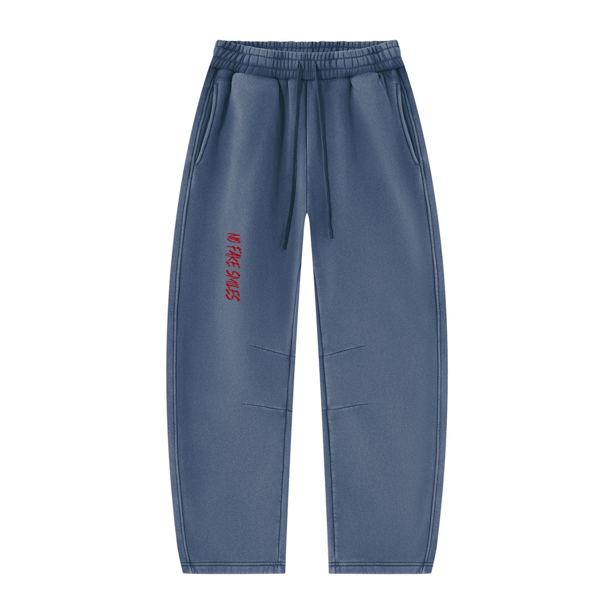 No Fake Smiles vintage wash blue fleece sweatpants with a relaxed barrel-leg fit and red graphic logo detail.
