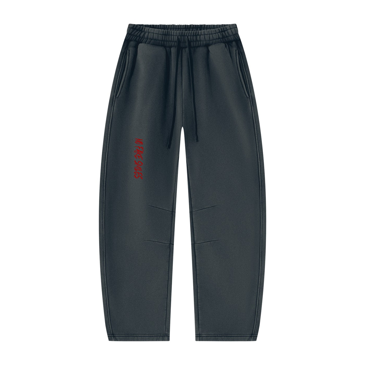 No Fake Smiles charcoal grey fleece sweatpants with a relaxed barrel-leg fit, drawstring waist, and red logo detail.