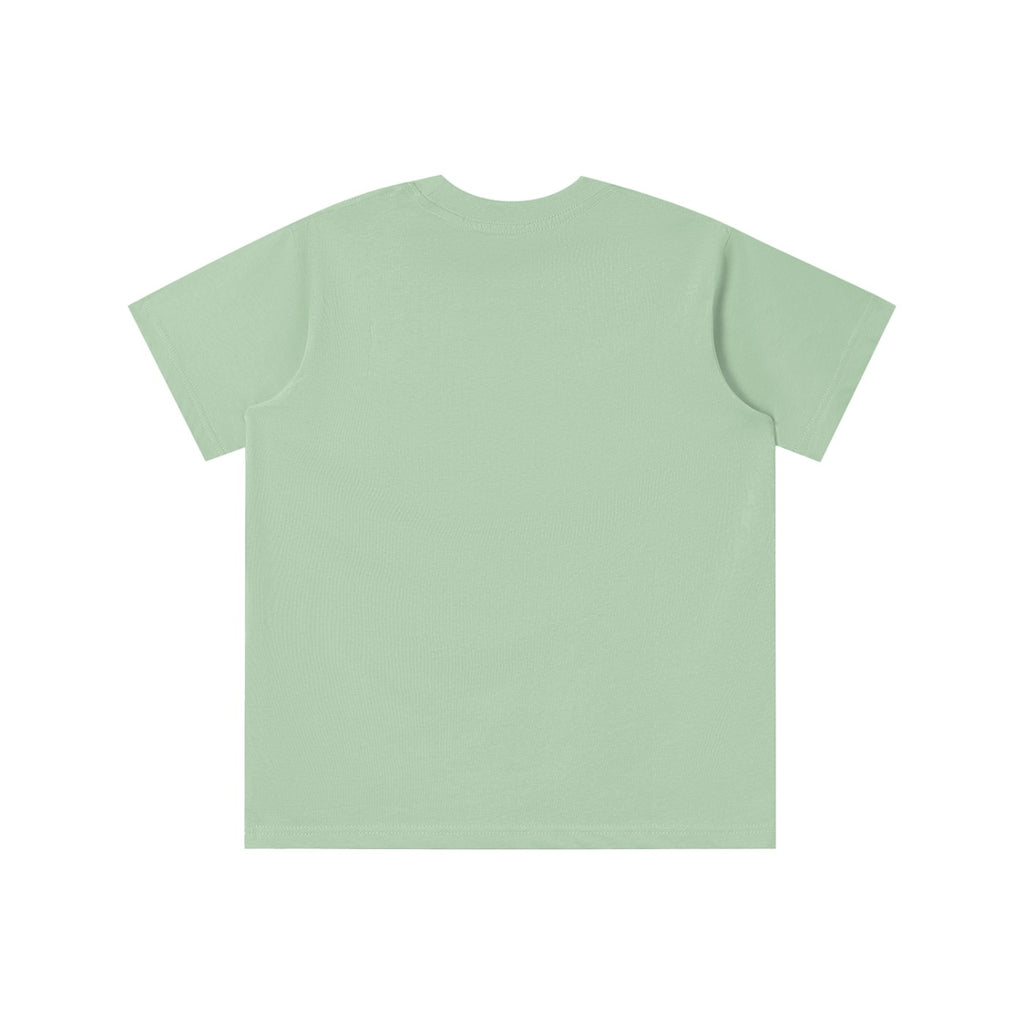 Back view of a light green No Fake Smiles kids' short-sleeve cotton t-shirt with a loose, casual fit.