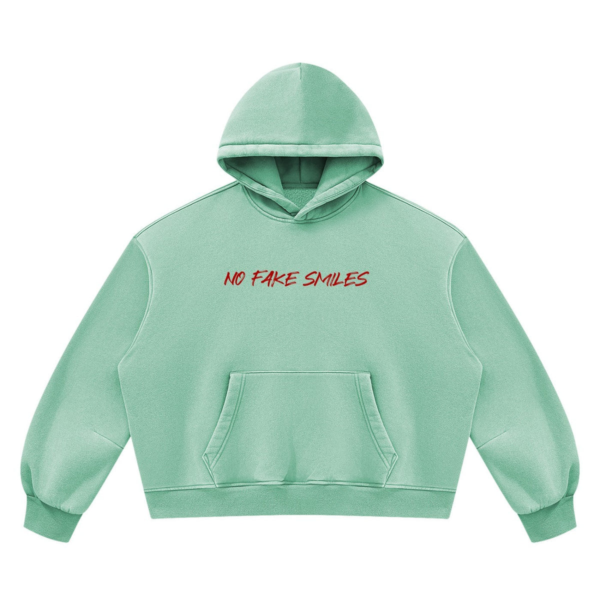 No Fake Smiles mint green boxy fleece hoodie with distressed red text graphic on the chest and kangaroo pocket.