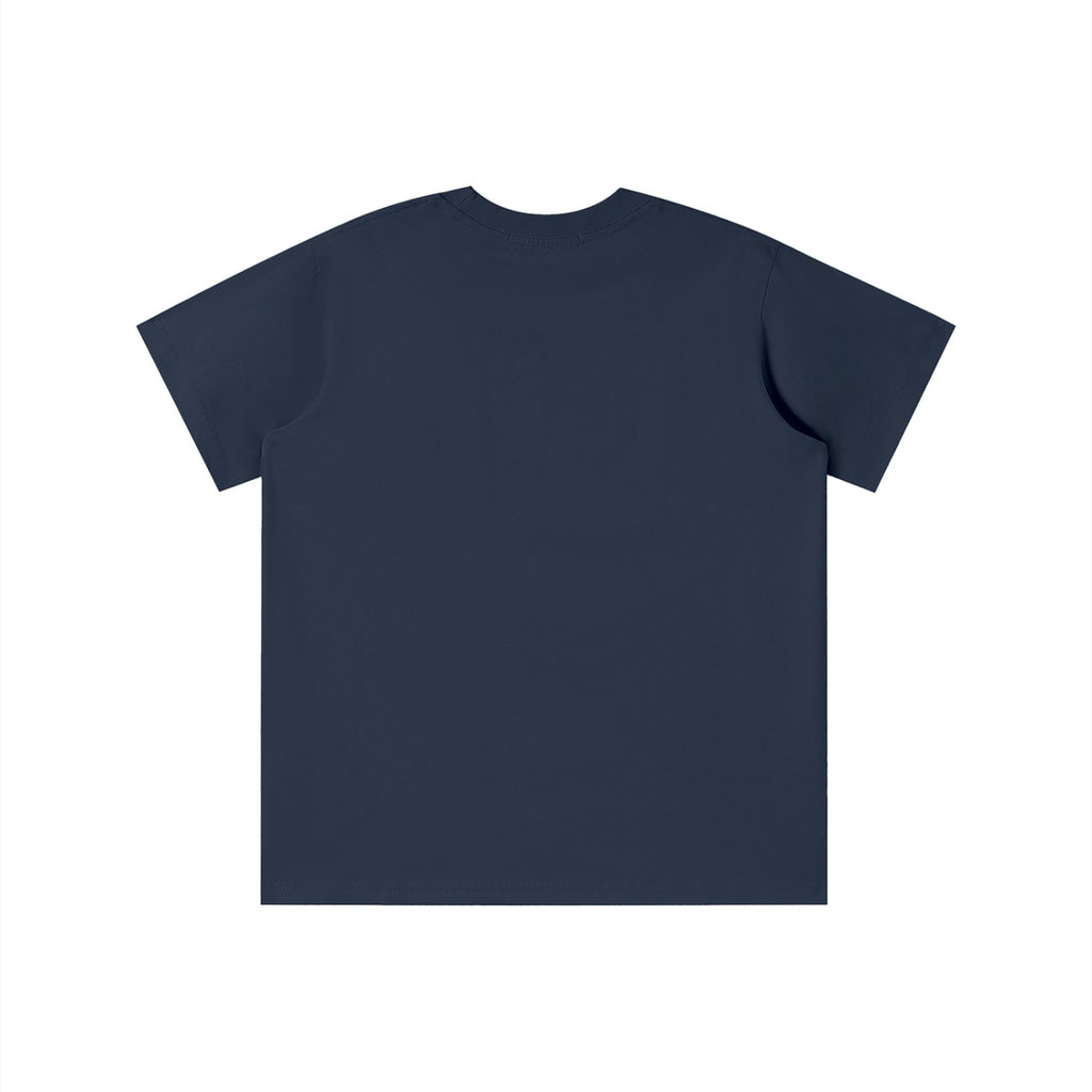 Back view of a plain navy blue No Fake Smiles kids' short-sleeve cotton t-shirt with a loose fit and round neck.