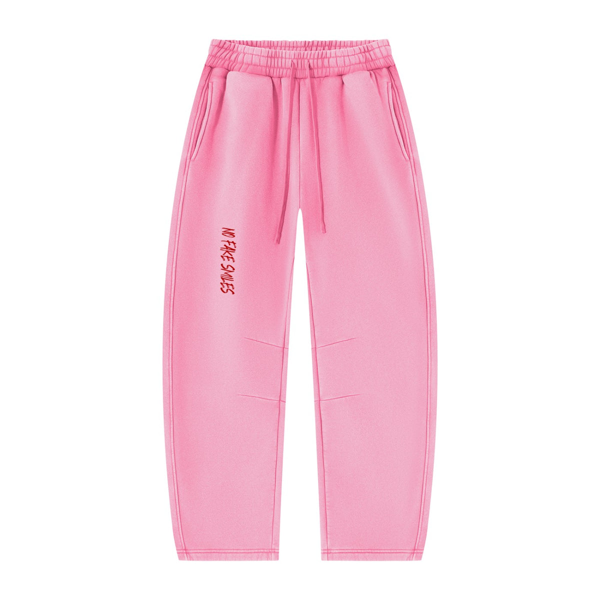 No Fake Smiles pink vintage wash fleece sweatpants with a relaxed barrel-leg fit, drawstring waist, and side pockets.