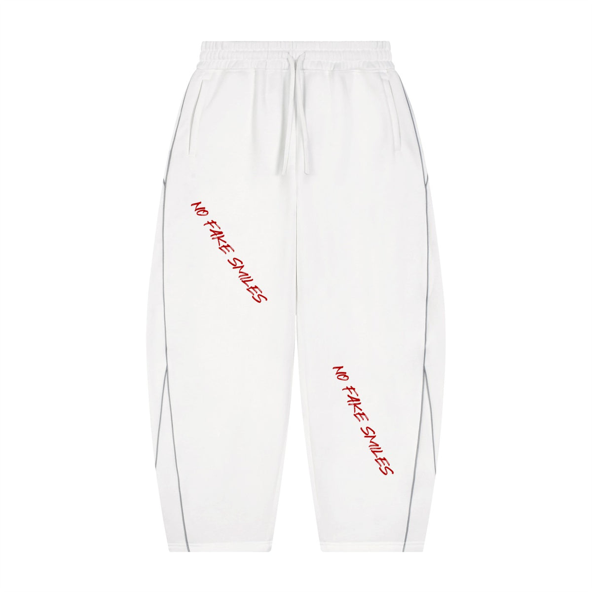 No Fake Smiles white heavyweight fleece sweatpants with a barrel leg silhouette, red slanted text, and piping details.