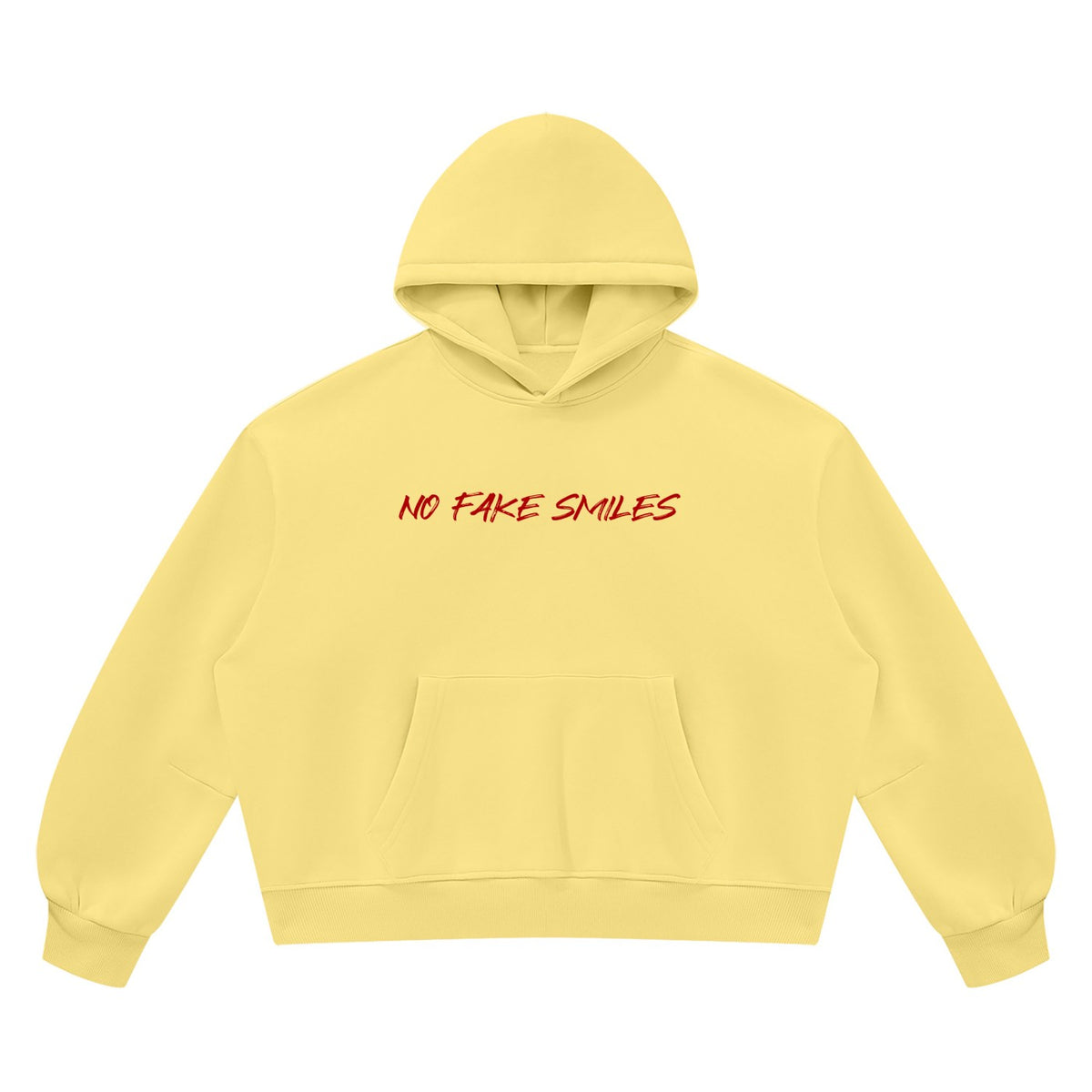 No Fake Smiles yellow boxy fleece hoodie with drop shoulders, front pocket, and red text print on the chest.