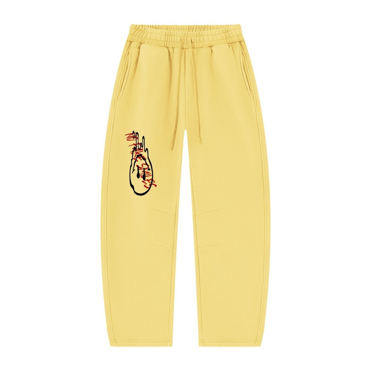 No Fake Smiles yellow fleece lounge sweatpants with a black and red artistic graphic print on the right leg